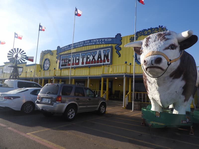 10 Unique North Texas Attractions : Roadside Oddities, Great Museums, Cute Prairie dogs! 5 “Big Texan Steak Ranch exterior with giant cow sign