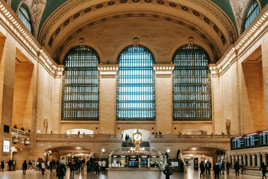 New York vs Tokyo: A Japan Traveler’s Thought on 2 Wonderful Cities 7 Interior of old Grand Central Terminal building with arched windows and ornamental ceiling over classic balconies