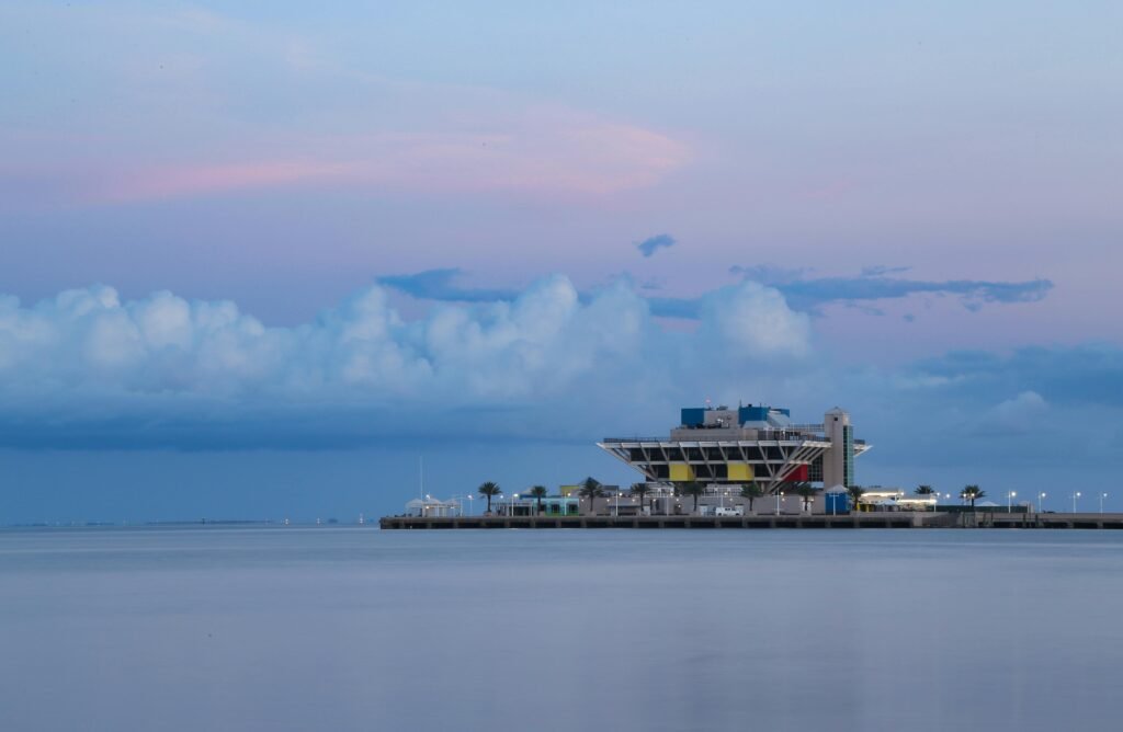 Free Things to Do Near Orlando, Tampa & St. Pete (besides theme parks) 8 Twilight view of the iconic St. Pete Pier with reflections on the calm water in St. Petersburg, Florida.